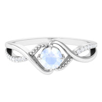Rosec Jewels 1/2 CT moonstone solitaire crossover ring with diamond, featuring a claw set design and elegant craftsmanship.