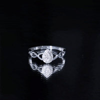 Illusion Set Round Diamond Crossover Engagement Ring