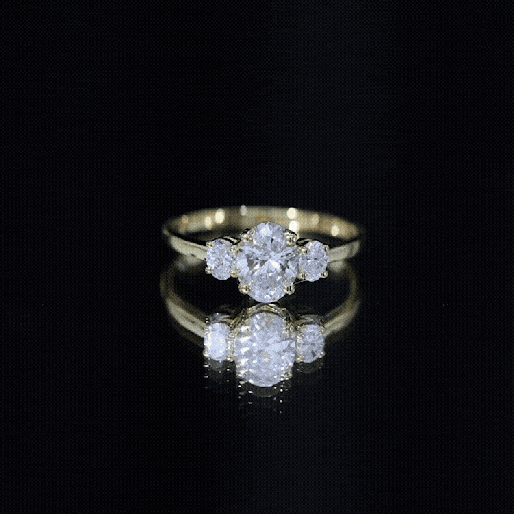 Yellow gold 3-stone engagement ring with lab-grown diamonds from Rosec Jewels, featuring a classic and elegant design.