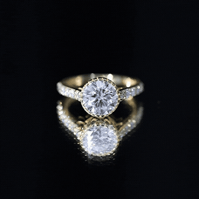 Yellow gold certified lab-grown diamond engagement ring with bezel setting and side stones, featuring Rosec Jewels craftsmanship.