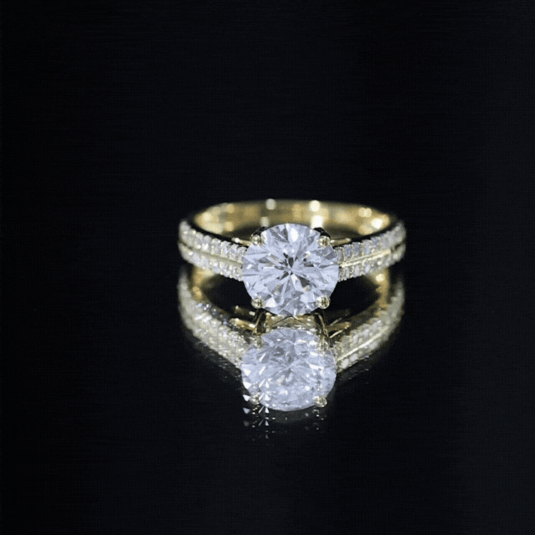 Yellow gold lab grown diamond engagement ring with 2 carats and side stones, showcasing a simple and elegant design from Rosec Jewels.