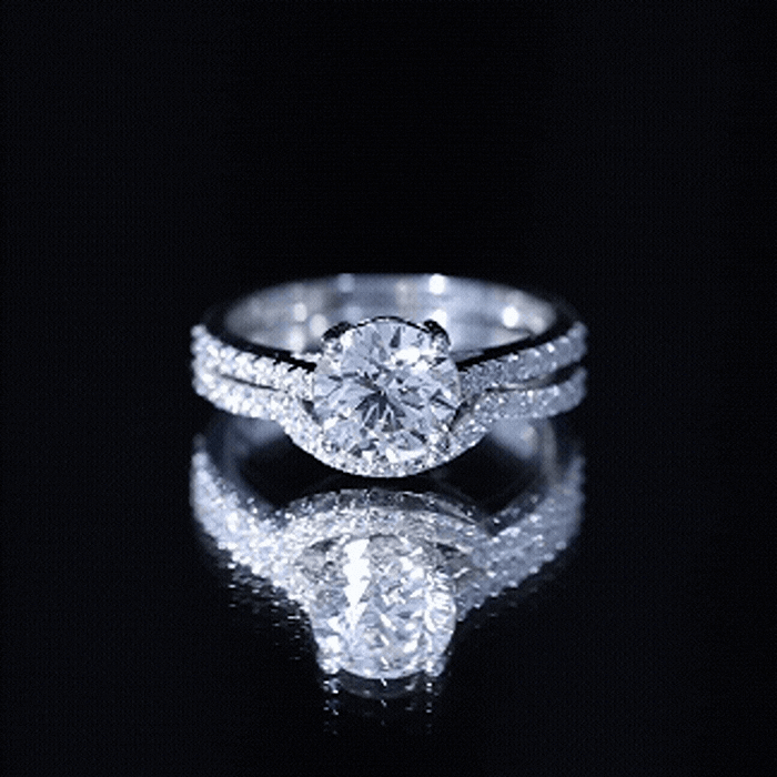Yellow gold lab-grown diamond 8mm round engagement ring with ring guard, featuring sparkling center diamond and intricate band design.