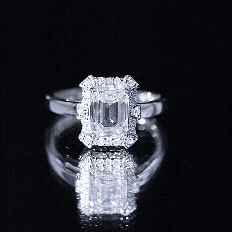 Yellow gold lab grown diamond engagement ring with a 1.8 carat emerald cut diamond, showcasing elegant and sparkling jewelry.