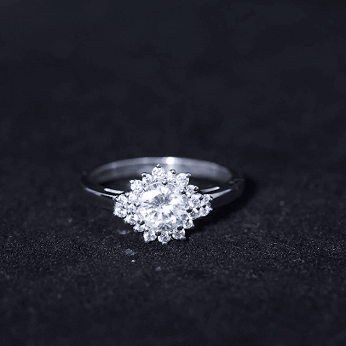 Yellow gold halo engagement ring featuring a 1-carat lab-grown diamond and intricate detailing, from Rosec Jewels.