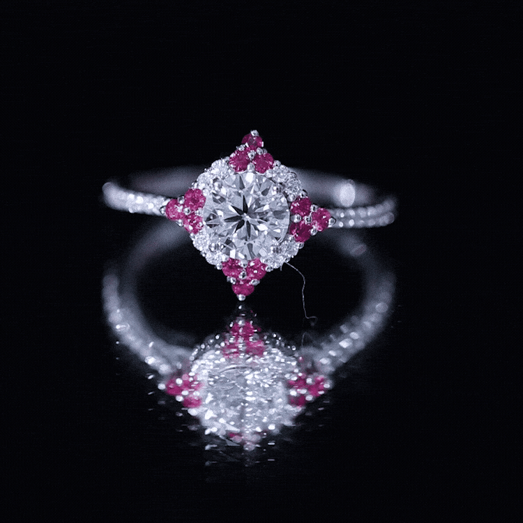Rosec Jewels lab-grown diamond halo engagement ring with ruby, yellow gold band, showcasing a sparkling central diamond and vibrant ruby.
