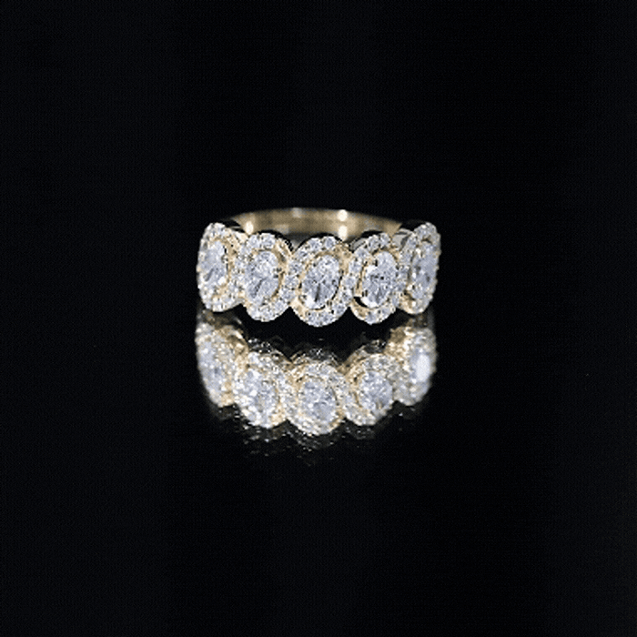 Yellow gold oval lab-grown diamond eternity ring by Rosec Jewels, showcasing a continuous row of sparkling diamonds on a sleek band.