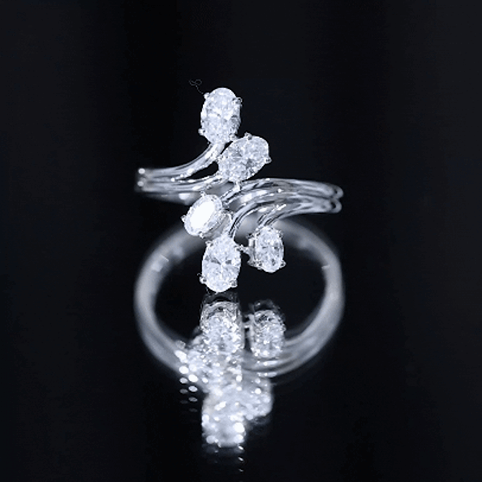Oval lab-grown diamond cocktail ring by Rosec Jewels featuring a yellow gemstone and intricate designer detailing.