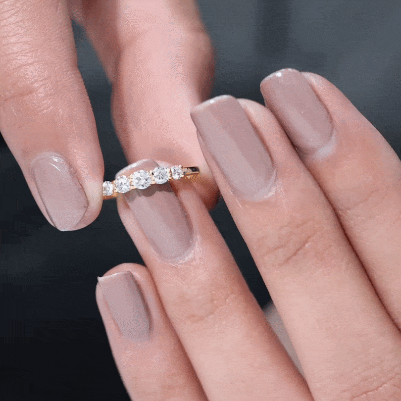 Round cut moissanite five-stone promise ring in yellow gold with a detailed band, from Rosec Jewels.