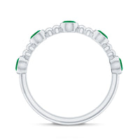 Bezel Set Emerald Half Eternity Ring with Beaded Design