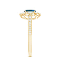 Oval cut London Blue Topaz vintage engagement ring with diamond accents, featuring Rosec Jewels branding in a detailed jewelry image.