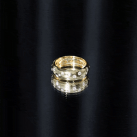 Yellow gold Scatter Moissanite wedding wide band ring by Rosec Jewels with sparkling moissanite stones.