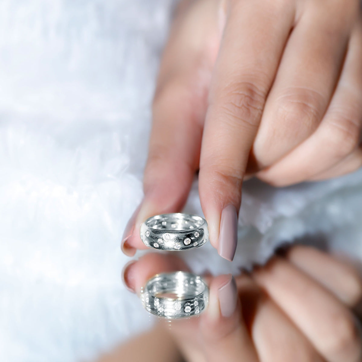 Wide band Moissanite wedding ring with sparkling scatter stones, crafted by Rosec Jewels.