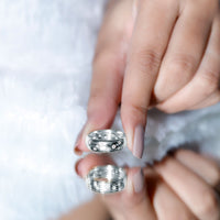 Wide band Moissanite wedding ring with sparkling scatter stones, crafted by Rosec Jewels.