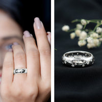 Wide band ring with scatter moissanite gemstones from Rosec Jewels, featuring a sparkling, elegant wedding ring design.