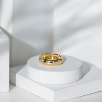 Wide band ring with scatter moissanite stones, rose gold finish, elegant wedding jewelry by Rosec Jewels.
