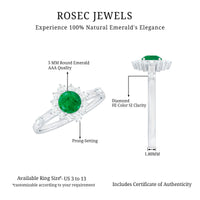 Rosec Jewels 5mm round emerald promise ring with diamond halo, showcasing a sparkling green gemstone and elegant design.