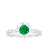 Rosec Jewels 5mm round emerald promise ring with diamond halo, featuring a detailed silver band and elegant design.