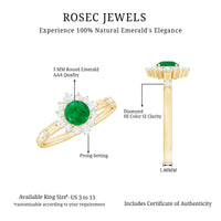 Rosec Jewels 5mm round emerald promise ring with diamond halo, showcasing a sparkling emerald centerpiece and elegant design.