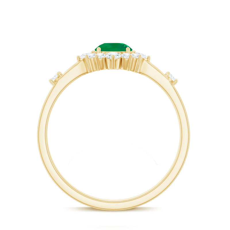 Rosec Jewels 5mm round emerald promise ring with diamond halo, featuring a polished silver band and intricate detailing.
