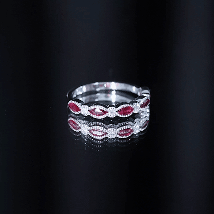 Certified Marquise Ruby half eternity ring with lab diamonds, showcasing a yellow gold band and intricate gemstone setting.