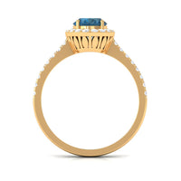 Rosec Jewels 2 CT oval cut London Blue Topaz solitaire ring with diamond halo, showcasing a stunning blue gemstone and sparkling accents.