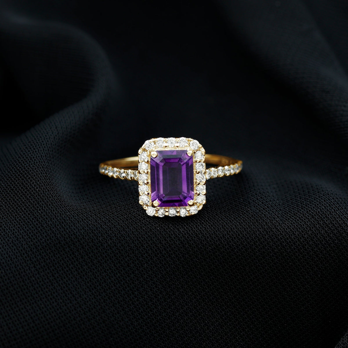 Emerald cut 1.4 carat amethyst engagement ring with diamond halo by Rosec Jewels, showcasing the detailed gemstone setting.