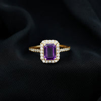 Emerald cut 1.4 carat amethyst engagement ring with diamond halo by Rosec Jewels, showcasing the detailed gemstone setting.