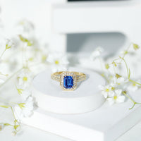 Certified 1.7 Carat Lab Grown Blue Sapphire Emerald Cut Engagement Ring with Diamond Halo