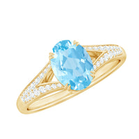 Genuine 1 carat oval aquamarine engagement ring with diamond split shank by Rosec Jewels, showcasing the detailed craftsmanship.