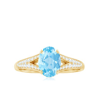 Genuine 1 Carat oval aquamarine engagement ring with diamond split shank by Rosec Jewels, featuring a sparkling center stone and elegant design