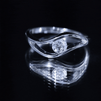 Certified 0.98 Carat Round Moissanite Solitaire Ring with Tension Setting
