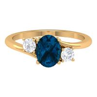 6X8mm Oval Cut London Blue Topaz Three Stone Engagement Ring with Diamond