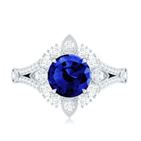 Rosec Jewels 2.7 carat lab-grown blue sapphire flower engagement ring with diamond accents, showcasing intricate floral design.