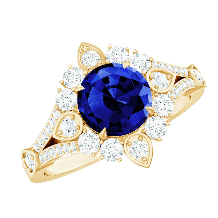 Lab grown blue sapphire flower engagement ring with diamonds, featuring a 2.7 carat blue sapphire center and intricate floral design.
