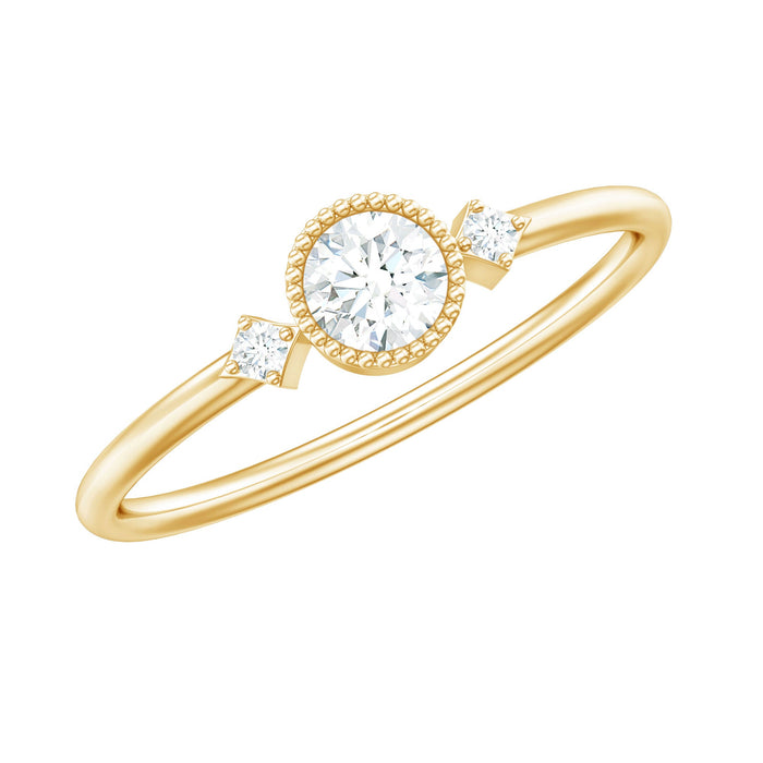 Minimal diamond promise ring in bezel setting by Rosec Jewels, showcasing a sleek gold band with a small sparkling diamond.