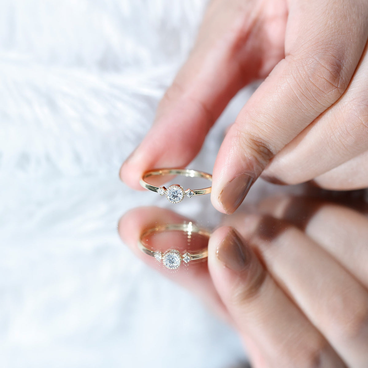 Minimal diamond promise ring in bezel setting by Rosec Jewels, featuring a sleek band with a small sparkling diamond.