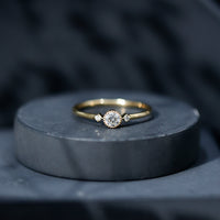 Minimal diamond promise ring in bezel setting with sleek band, crafted by Rosec Jewels, showcasing elegant fine jewelry design.
