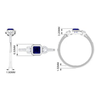 Princess cut blue sapphire engagement ring with diamonds by Rosec Jewels, featuring a vibrant blue sapphire centerpiece and sparkling accents.