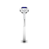 Blue sapphire princess cut engagement ring with diamond accents, crafted by Rosec Jewels, showcasing a stunning blue gemstone setting.
