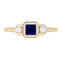 Princess cut blue sapphire engagement ring with diamond accents from Rosec Jewels, showcasing the elegant blue sapphire centerpiece.