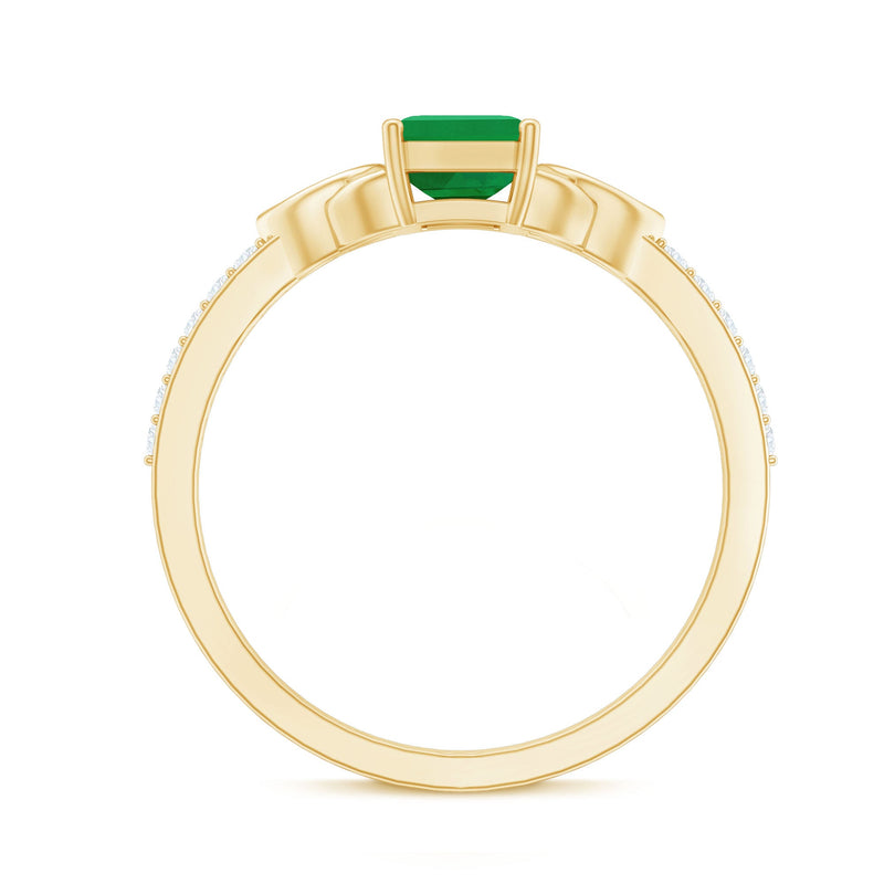 Natural 5x7mm emerald cut emerald diamond engagement ring with Celtic knot design by Rosec Jewels.