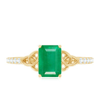 Natural 5x7mm emerald cut emerald diamond engagement ring with Celtic knot detail, crafted by Rosec Jewels.