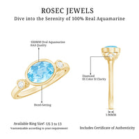 Bezel set aquamarine and diamond engagement ring by Rosec Jewels featuring an east-west design and elegant precious gemstone setting.
