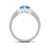 7x10mm Pear Shape London Blue Topaz Halo Engagement Ring with Diamond