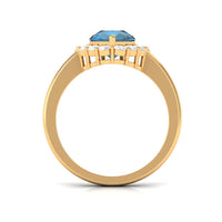 7x10mm Pear Shape London Blue Topaz Halo Engagement Ring with Diamond