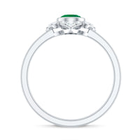 Natural bezel set 5mm emerald flower engagement ring with diamond from Rosec Jewels, showcasing intricate floral design and sparkling gemstones.