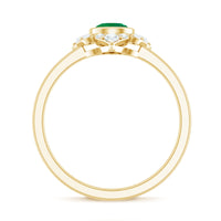 Natural bezel set 5mm emerald flower engagement ring with diamond from Rosec Jewels, showcasing detailed floral design and sparkling accents.