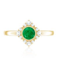 Natural bezel set 5mm emerald flower engagement ring with diamond from Rosec Jewels, showcasing intricate floral design and sparkling accents.