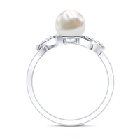 Freshwater pearl solitaire crossover engagement ring with diamond from Rosec Jewels, showcasing the elegant design and sparkling stone.