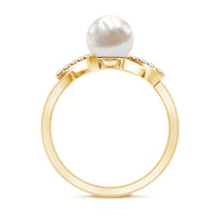 Freshwater pearl solitaire crossover engagement ring with diamond from Rosec Jewels, showcasing elegant design and sparkling accents.